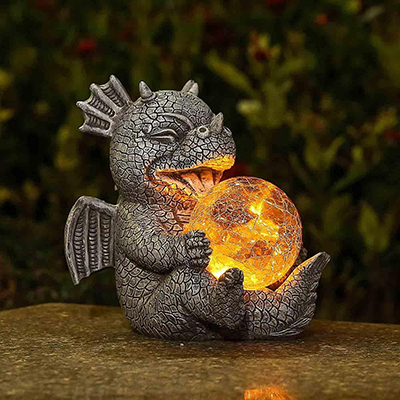 Adorable Baby Dragon Holding Orb Statue